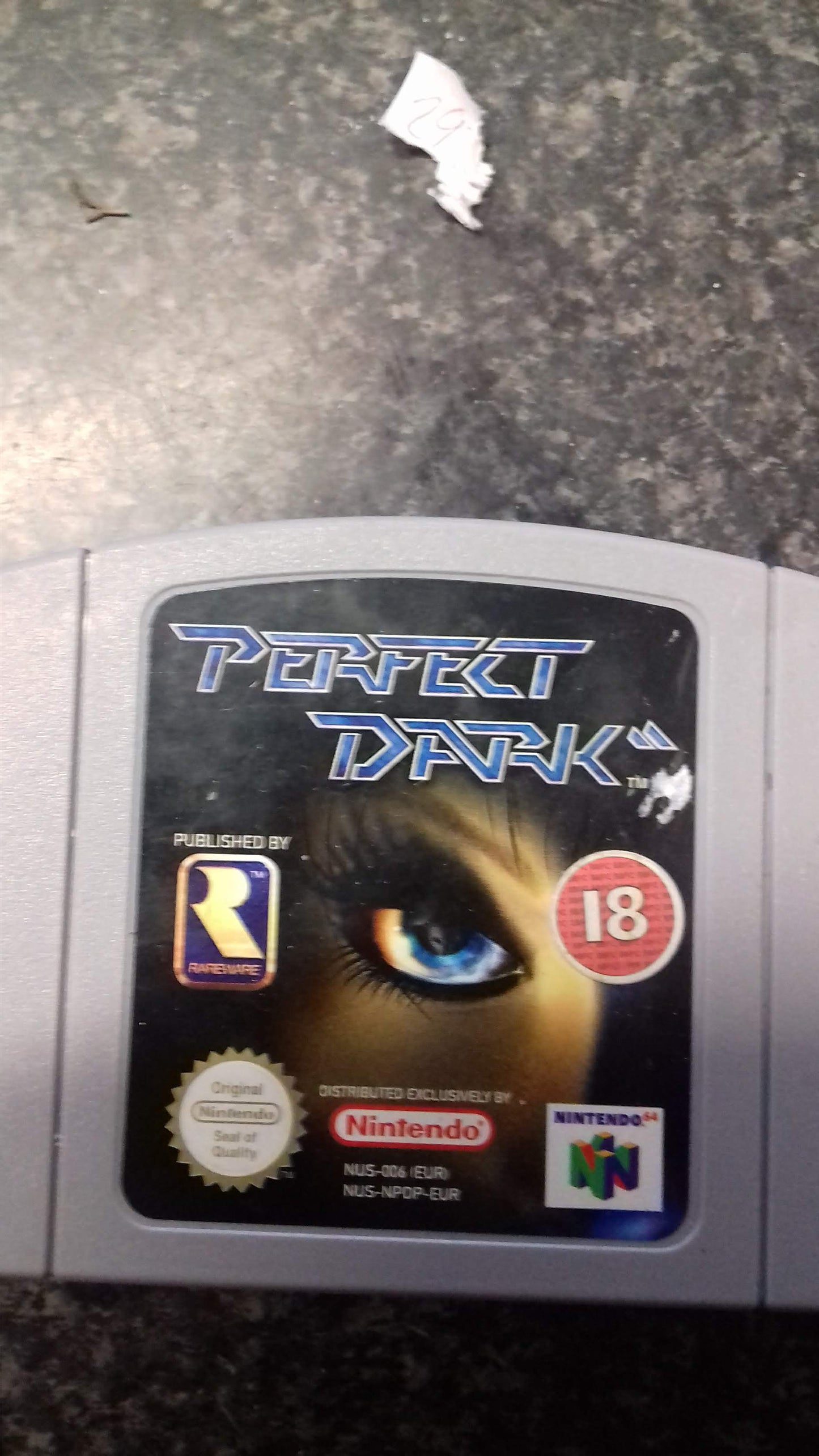 A rare collectible video game called Perfect Dark. Only available on the Nintendo 64